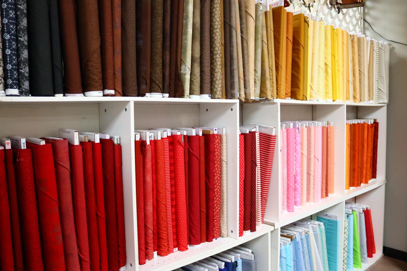 Bolts of fabric at Plaid Sheep Company